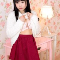 Cute Asian teen Yui Kawagoe discards a skirt lingerie to pose nude