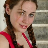 European amateur in braided ponytails showcasing little tits and wooly vagina