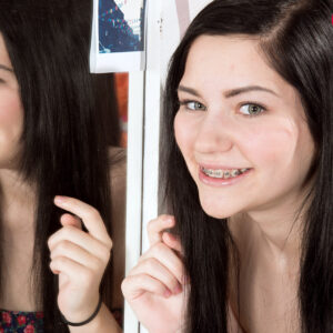 Barely barely legal black-haired Karly Baker demonstrates her braces previous to getting entirely naked