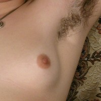 Euro amateur Gypsy showcasing pierced swell nips, wooly armpits and hairy pubic hair